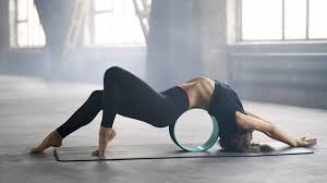 9 best yoga poses for groin pain relief. 33 Yoga Wheel Exercises To Try Today With Photos Yoga Kali