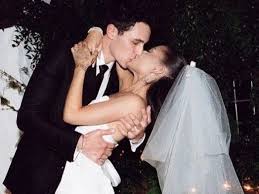 She took to instagram with photos of the big day, captioning it, 5.15.21, including photos of herself in a vera wang wedding dress and kissing gomez, who wore a tom ford suit. E4zehbk07eo4tm