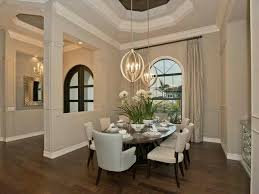 Their home is an excellent example of color that effectively flows from room to room, creating spaces that are dramatic and comfortable. Front Door Entrance Hallway Dining Room Open Concept Open Concept Kitchen Living Room Dining Room Combo Open Dining Room