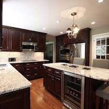 Because of new river white's inherent beauty, it's in great demand. River White Granite With Espresso Cabinets Dark Wood Kitchen Cabinets Contemporary Kitchen Espresso Kitchen Cabinets