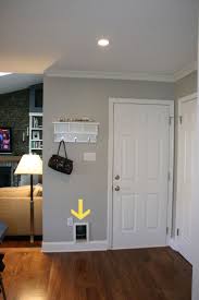 Litter Box Access To The Garage Via A Small Cat Flap Installed Right In The Wall How Clever Home Hiding Cat Litter Box Cat Litter Box