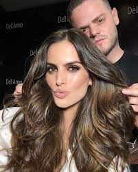 Maria izabel goulart dourado on october 23, 1984 in são carlos, são paulo, brazil) is of italian and french descent and has four brothers and one sister. 45 6k Likes 372 Comments Izabel Goulart Izabelgoulart On Instagram Kisses From Brazil On Set For Dellannoof Hair Ribbons Hair Styles Cool Brown Hair