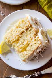 lemon coconut cake with deliciously moist coconut cake layers homemade lemon curd toasted coconut and c lemon coconut cake homemade lemon curd lemon coconut