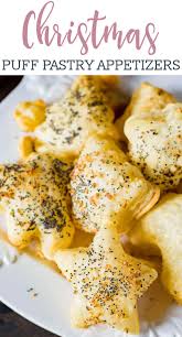 Finger foods are the best for keeping your guests satisfied until the main meal is served. Christmas Appetizer Puffs Paired With Veggies And Flavored Hummus
