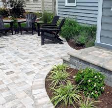 To ensure your patio is level and has proper drainage, layer the materials and smooth out each layer. Paver Patios In Virginia Beach Landscaping Virginia Beach Va