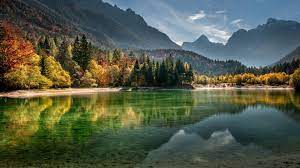 Stream 4k video in every room: Calm Body Of Water Surrounded With Trees And Mountains During Daytime 4k Nature Hd Desktop Wallpaper Widescreen High Definition Fullscreen