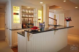 Experiment in small doses with a bright white basement bar. Custom Bar Wet Bar Designs The Kitchen Studio Studio Kitchen Wet Bar Designs Basement Bar