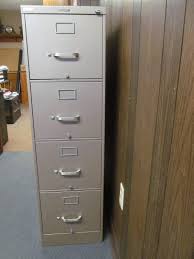 Pull the drawer out of the cabinet until it stops. Steelcase File Cabinet Jax Of Benson Sale 654 K Bid