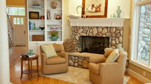 A stone fireplace can greatly enhance any home's design aesthetic, exuding a rustic elegance that makes your space feel warm and extremely comfortable. 19 River Stone Fireplaces For Nature Inspired Home