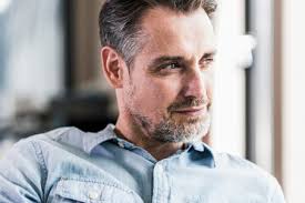 Portrait of serious looking senior man stock photo