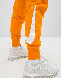 Nike - Exclusivité ASOS - Pantalon de jogging - Orange | ASOS