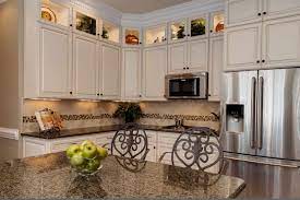 Avoid overly dark countertops with dark cabinets, as both shades can make your kitchen feel white kitchen cabinets are currently more popular than dark cabinets, but the darker look is wilora paloma marquis dark wood. 12 Most Elegant White Cabinets With Brown Granite You Must Look Before Your Next Project Jimenezphoto