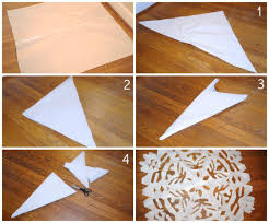I'm going to show you how to make two different giant paper snowflakes. Giant Colorful Paper Snowflakes Homegrown Friends