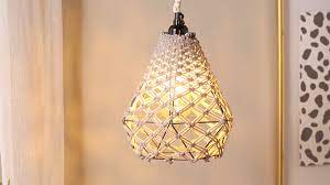 This is a diy tutorial for a macrame hanging pendant light. Macrame Hanging Light Better Homes Gardens