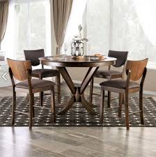 Tuck a round table with a pedestal base into a corner for a snug eating area. Meralina Counter Height Round Top Dining Table Furniture Store Los Angeles