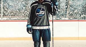The nhl and adidas describes it as such in a document provided to the hockey writers: Jets Reveal New Reverse Retro Sweaters For 2020 21 Game On Media