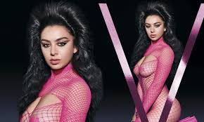 Charli XCX leaves little to the imagination as she rocks a revealing pink  fishnet bodysuit for Gen V | Daily Mail Online