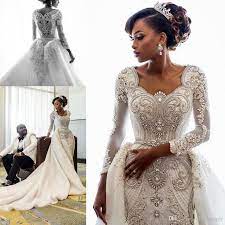 New high qulity lace mermaid wedding dress illusion chaple train ivory beading bridal gown. Discount 2019 Beading African Wedding Dresses Crystals Overskirts Luxury Long Sleeves Shea African Wedding Dress Sweetheart Bridal Gown Expensive Wedding Dress
