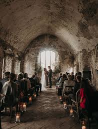 Moody Castle Wedding In Wales With Overgrown Florals Unique Wedding Venues Church Wedding Flowers