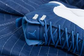 Dressed in a stone blue, legend blue, and obsidian color scheme. Nike Air Jordan 12 Retro Stone Blue Up There