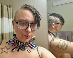 Hi everyone! My name is Missy. I'm 25 years old and I've had my Mohawk  since 2012. I have 14 tattoos and 10 piercings. Here are some of my looks.  But I
