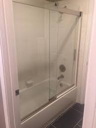 Discover a shower door that perfectly fits and beautifies your space at kohler.com. Kohler Levity 60 In X 62 In Semi Frameless Sliding Tub Door In Silver With Handle K 706000 L Sh The Home Depot Tub Doors Tub Shower Doors Bathtub Doors