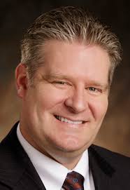 Zions brings manager to Eighth & Main