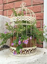 Adding a birdcage planter to your garden is a great idea. Birdcage Flower Planter A Beautiful Way To Display Your Flowers