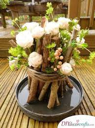 A Bundle Of Sticks And Flowers Mother Nature Itself Rustic Wedding Centerpieces Woodland Wedding Centerpieces Flower Centerpieces Wedding