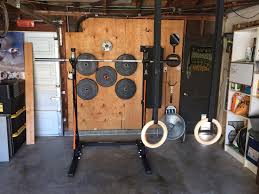 If you're also tired of going to the gym and just want to do it at home, these homemade squat rack plans can help you out! First Home Gym With Diy Wall Weight Rack Homegym