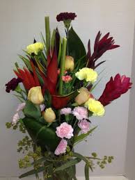 Hawaiian And Roses Unique Flower Arrangement By Pamela At Roadrunner Florist Basket Express Ph Unique Flower Arrangements Flower Delivery Flower Arrangements