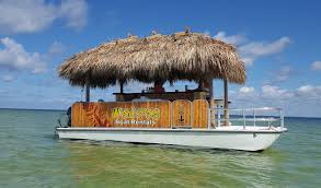 All things to do in madeira beach; Tiki Bar Boat Charters Tikiboat Rides Tampa Bay Fl Tiki Boat Booze Cruise Boat Trips Near Tarpon Springs And New Port Richey Florida