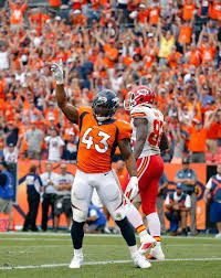 Denver Broncos Strong Safety T J Ward 43 Celebrates A Fourth Down Stop Against The Kansas City Chiefs In The Clo Denver Broncos Broncos Cheerleaders Broncos
