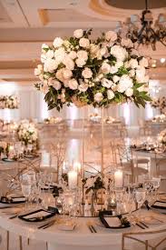 Tall White Rose Centerpiece On Gold Stand In 2020 Rose Centerpieces Wedding White Rose Centerpieces Tall Wedding Centerpieces