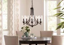 Feed the light fixture's black and white wires through the hole in the center plate. Ceiling Lights