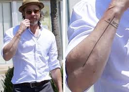 Brad pitt has four tattoos which we know of, including an outline tattoo on his left forearm of ötzi the iceman, aka frozen fritz and similaun man. Brad Pitt Displays Tattoo Honoring Angelina Jolie And Kids