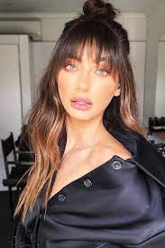 For long hair, try these equally long bangs that are straight, statement making, and come past the eyebrows. Round Face Long Hair With Wispy Bangs Novocom Top