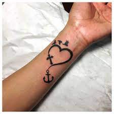 Anchor tattoo designs, anchor tattoos for men, anchor tattoos for girls, anchor with heart tattoo, anchor with cross tattoo, anchor with birds tattoo, anchor stars tattoo, anchor tattoo design on arms, back, leg, sidebody, feet. 57 Anchor Cross Tattoos Collection