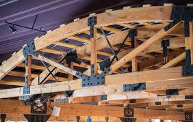 Steel Connector Plates Give A Timber Frame A Look Reminiscent Of Old School Factories And Mill Buildings Desc Timber Framing Roof Trusses Timber Frame Joinery