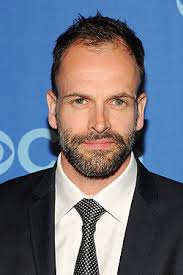 Miller was born in brooklyn, new york, the son of anna (née diamond) and benedict miller. Jonny Lee Miller Elementary Wiki Fandom
