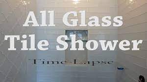 Lay the tiles out on the counter or on the floor in measure the area on the backsplash that you plan on installing the tile on. Complete Glass Tile Shower Install Start To Finish Time Lapse Youtube
