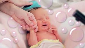 Continue supporting the baby throughout the bath with one hand, and use the other hand to wash him or her. Our Newborn Baby S First Bath At Home Youtube
