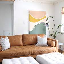 Add a chic, modern art piece to your home that frames a beautiful sunset within a minimalist, monochromatic print. Mid Century Modern Abstract Canvas Painting Ideas Harlow Thistle