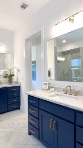 We did not find results for: Beautiful Master Bathroom With Navy Painted Cabinets Gold Accent Hardware Click To See More Mode Black Bathroom Decor Bathroom Remodel Master Blue Bathroom