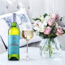 Send flowers and wine to someone. Flowers Wine Flower Bouquets Wine Blossoming Gifts