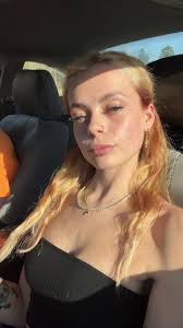 Man Shaking His Starbucks Drink with His Mouth