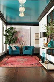 Jeckyll incorporated gilded antique leather wall hangings. How To Decorate With Peacock Blue Green Dining Room Decor Blue Decor