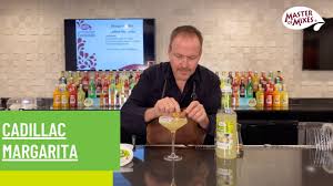 Shake tequila, lime juice, and simple syrup. How To Make The Cadillac Margarita Youtube