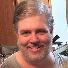 Pierce Brosnan's wearing a Kinks "the road" tee shirt in Thursday murder  club 👍🏼