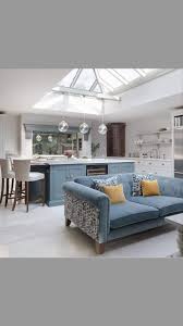 As unusual as it may sound, placing a sofa in the kitchen is a modern and trendy interior solution. Love The Blue On The Sofa And Island Open Concept Kitchen Living Room Kitchen Sofa Open Concept Living Room